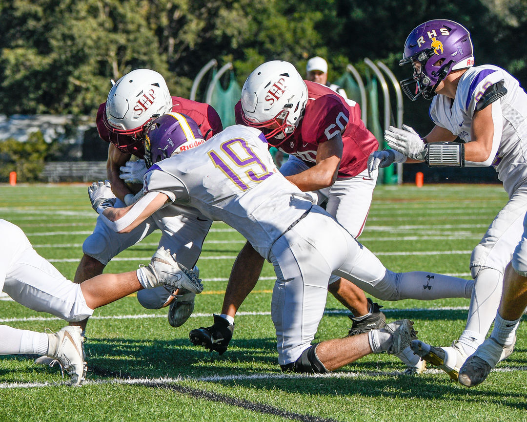 Hayden Baichtal (19) tackles Andrew Latu (8) at the CIF 5-A State Championship Game